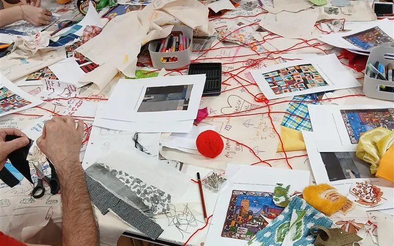 People participating in quilt-making workshop