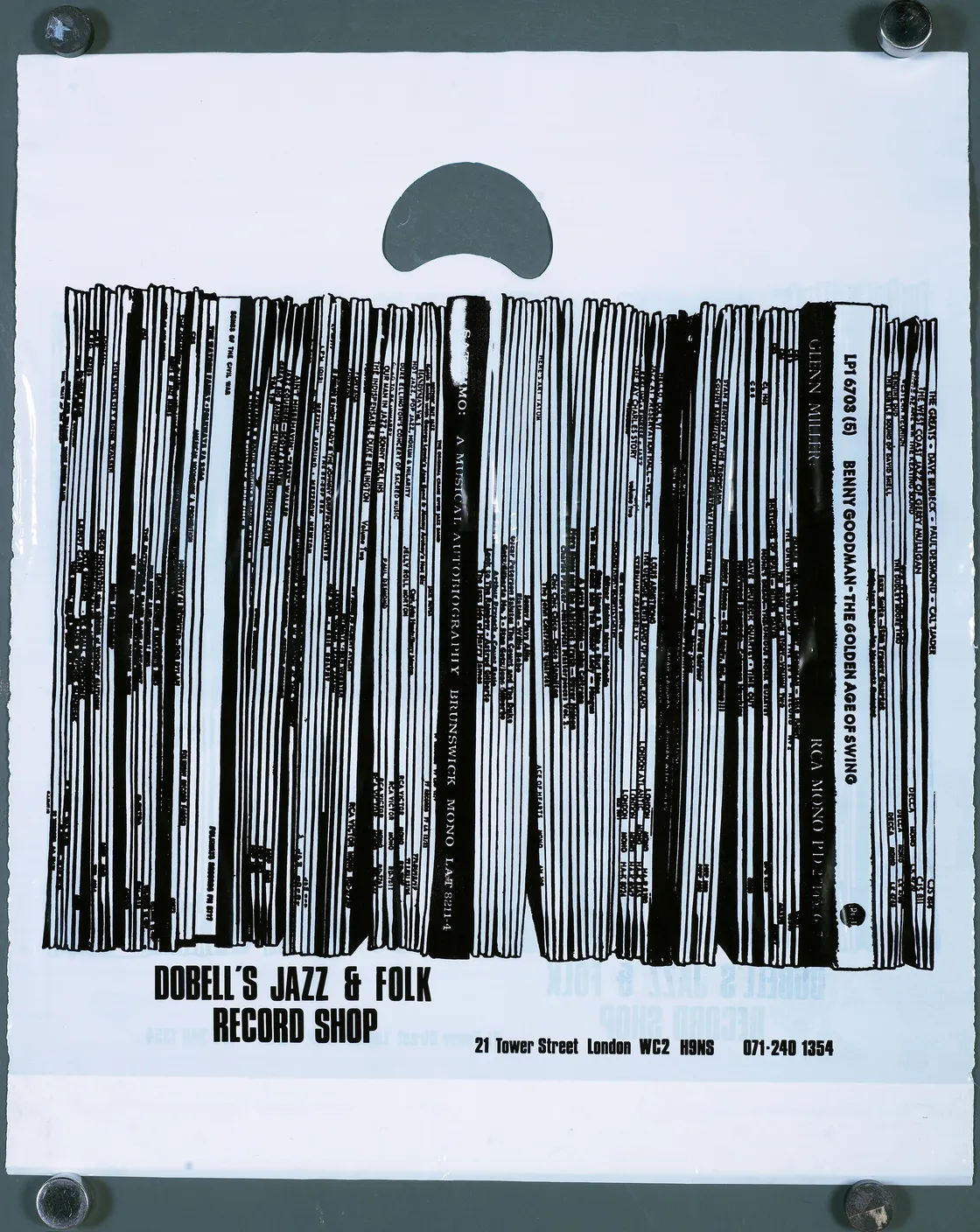 Plastic bag featuring a striking black illustration of vertically stacked records, prominently labeled “Dobell’s Jazz & Folk Record Shop.” The address and phone number are printed at the bottom, making this bag a classic keepsake for any jazz enthusi