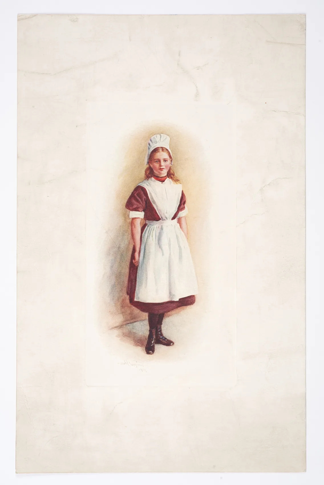 A young woman in a brown dress, white apron, and white cap stands facing forward against a plain background.