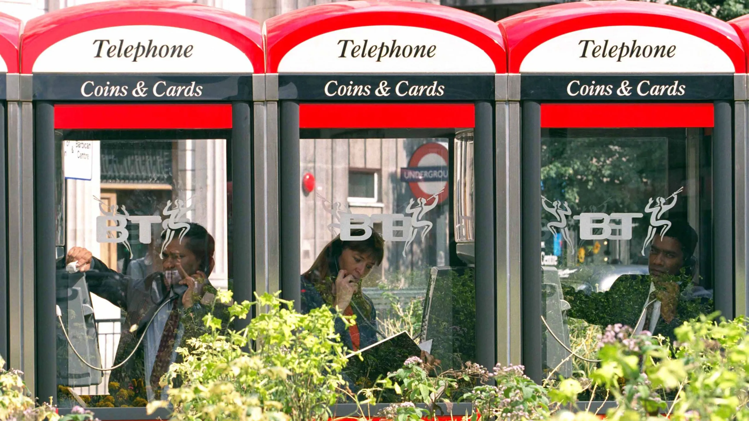 C38GGY Row of BT payphones on Cheapside in Central London.