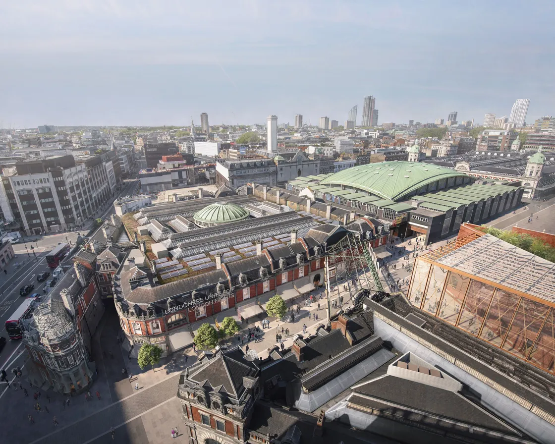 Aerial view of the new London Museum in Smithfield amid urban buildings and streets under a clear sky.