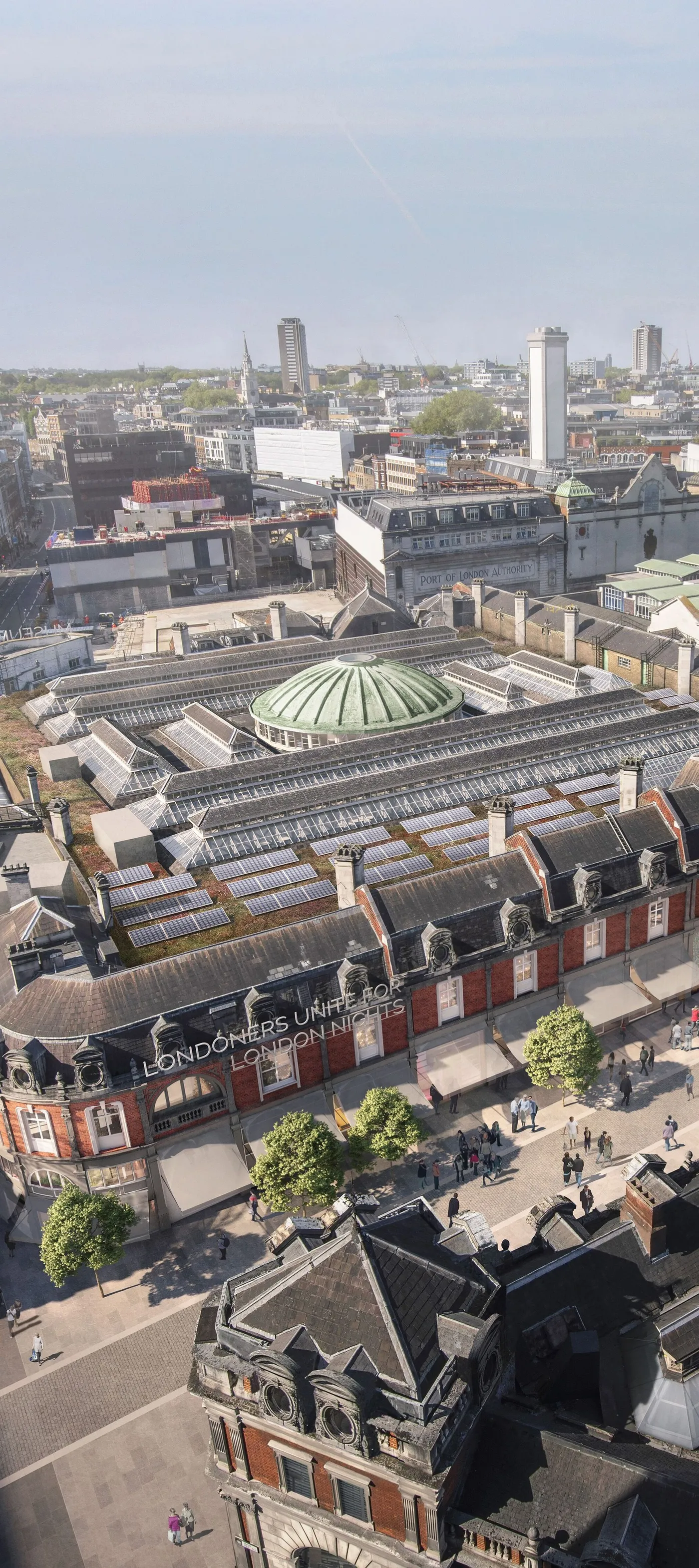 Aerial view of the new London Museum in Smithfield amid urban buildings and streets under a clear sky.