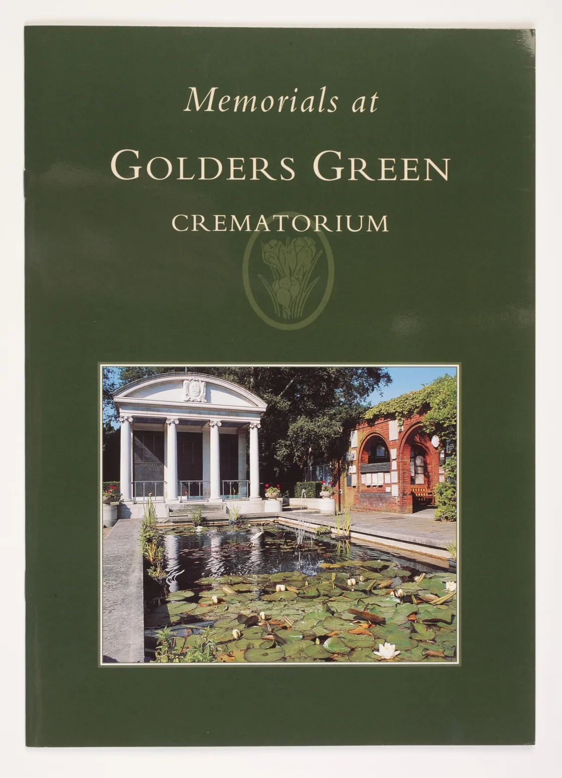 Brochure cover with the title "Memorials at Golders Green Crematorium" and a photo of a pond, white building, and brick structure.