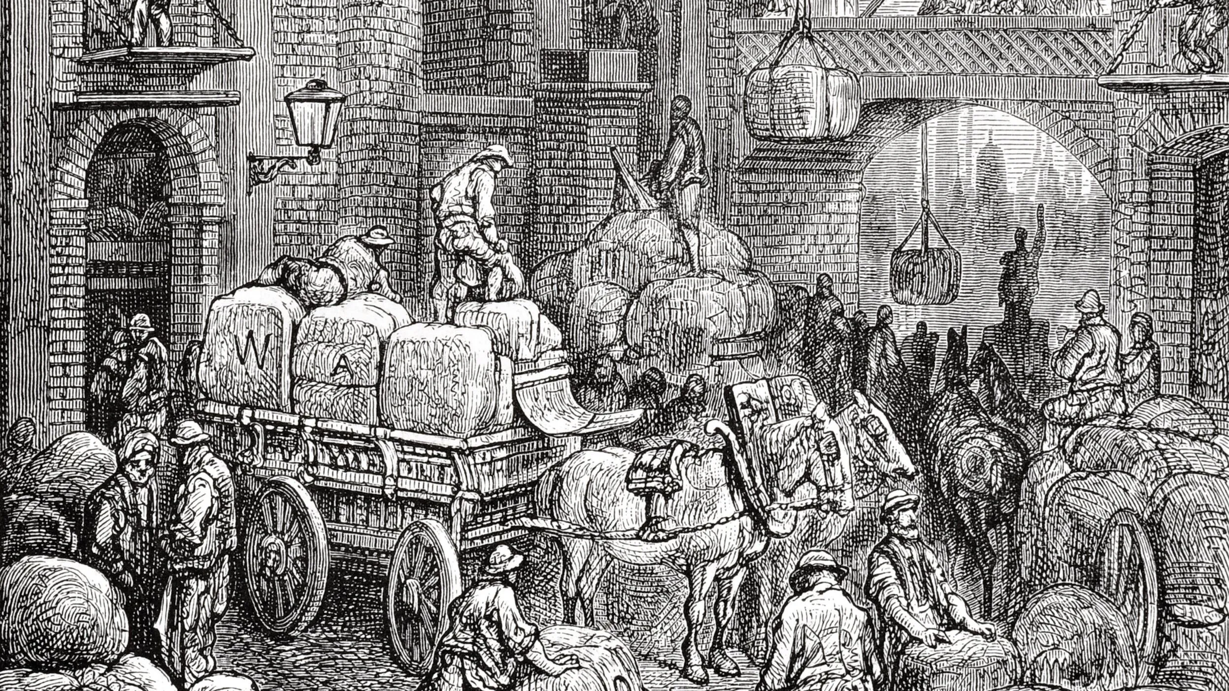 Engraving of a bustling 19th-century warehouse with workers loading and unloading goods, using pulleys for heavy items and carts for transportation.