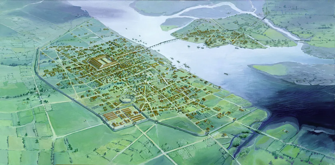 Aerial illustration of an ancient city with a grid layout, a central amphitheater, a large rectangular building, and surrounding waterways and bridges.