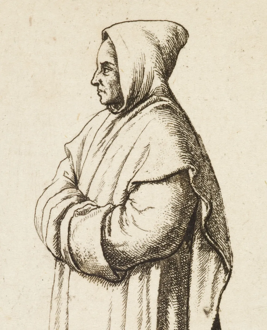 A sideways view of a hooded person