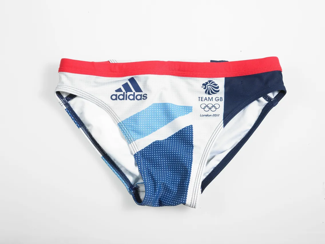 Adidas swim brief featuring the Team GB logo, London 2012, with a red waistband, blue and white design.